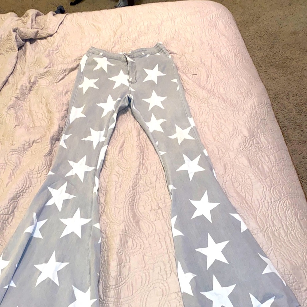 Altard state bell bottom jeans with stars in them